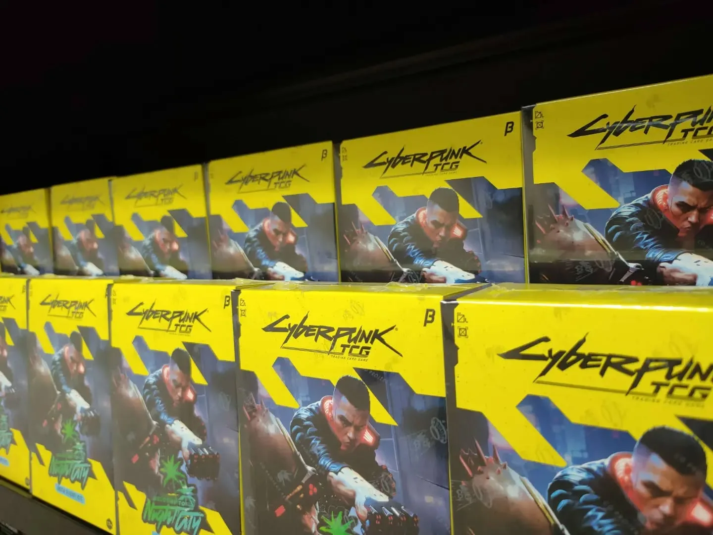 Cyberpunk TCG Beta Event Kits stacked ready for players at Ravenspire Games